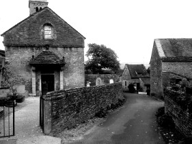 Street and church in the village of Taizé, close to the much larger and more crowded commune